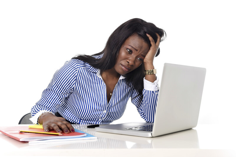 Frustrated Woman In Front Of Laptop