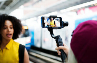 Young woman traveling and vlogging