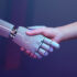 Robot hand shaking human hand