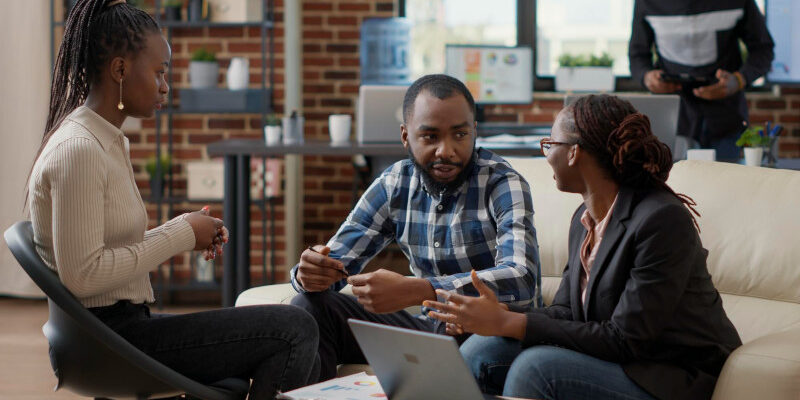 Team of business people having a collaborative discussion