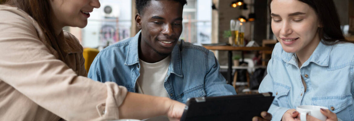 Business people discussing a project whilst looking at a tablet