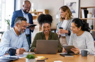 Happy Teamwork Around the Table
