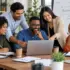 Diverse Team Brainstorming Around Laptop